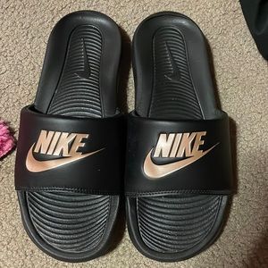 Black Nike slides
